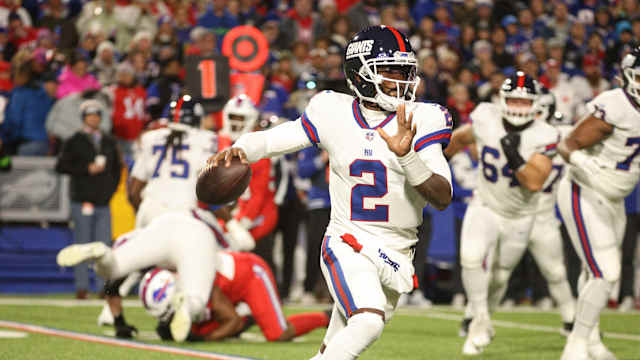 New York Giants quarterback Tyrod Taylor (2) looks downfield after being flushed out of the pocket.